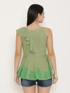 Peplum top with asymmetric ruffle and printed hem in Pista Green