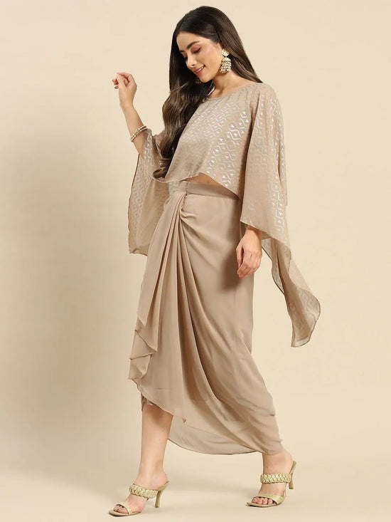 Cape top with draped skirt in Beige