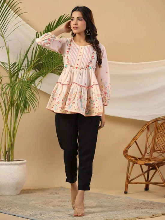 The Wonderland Women Peach Floral Printed Cotton Peplum Tunic With Thread Embroidery