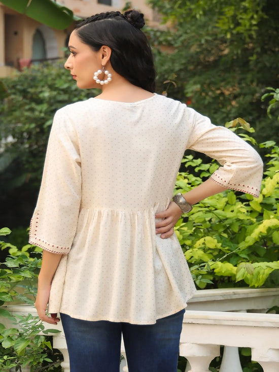 Ivory Polka Printed Peplum Rayon Slub Tunic.