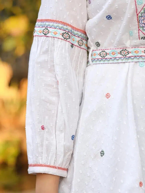 White Cotton Dobby Peplum Tunic With Multi Colored Thread Embroidery