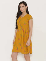 Short Block printed dress with front placket and side gathers in Mustard