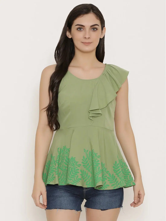 Peplum top with asymmetric ruffle and printed hem in Pista Green