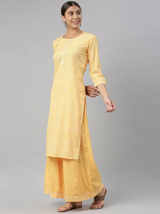 Ahika Women Crepe Yellow Bandhani Printed Straight Kurta Palazzo Set