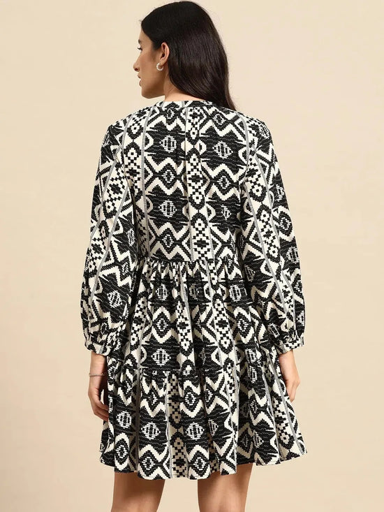 Mini Printed layered dress with balloon sleeve in Black and Cream Print