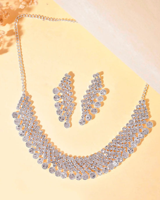 AD Stone Studded Silver Plated Necklace With Drop Earrings Set-VOJ344