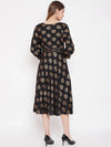 Front neck and waist tucks with baloon sleeve printed dress in Black