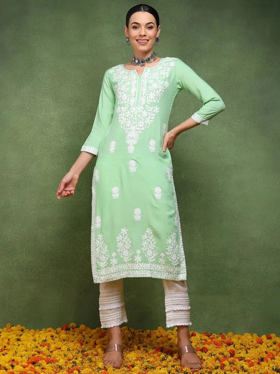 Ahika Women Green Viscose Rayon Solid Embroidered Straight Kurta