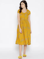 Midi pleated dress with lavender print on Mustard