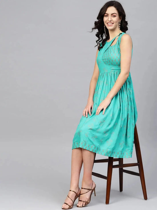 Printed Midi Dress with asymmetric overlap neck in Mint Blue