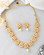 Gold Plated Pearl Studded Floral Necklace And Earrings-VOJ386