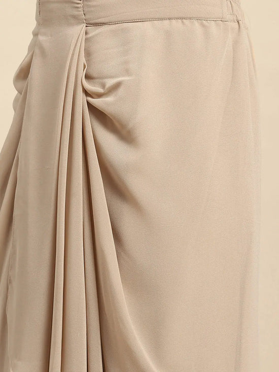 Cape top with draped skirt in Beige