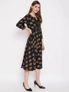 Front neck and waist tucks with baloon sleeve printed dress in Black