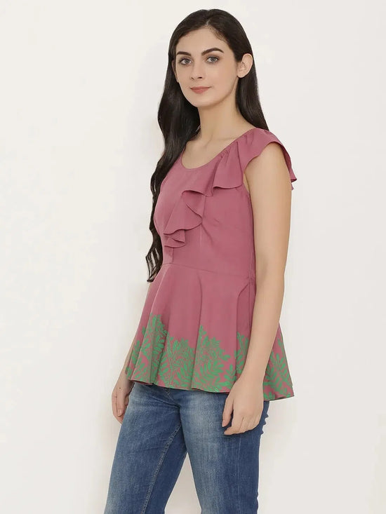 Peplum top with asymmetric ruffle and printed hem in Mauve