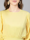 Women solid yellow smocked polyester puffed sleeve top