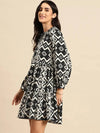 Mini Printed layered dress with balloon sleeve in Black and Cream Print