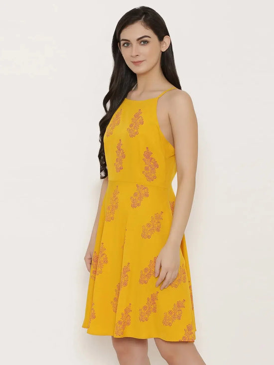 Backless with string design printed skater dress in Mustard