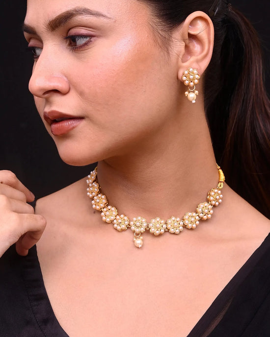 Gold Plated Pearl Studded Floral Necklace And Earrings-VOJ386