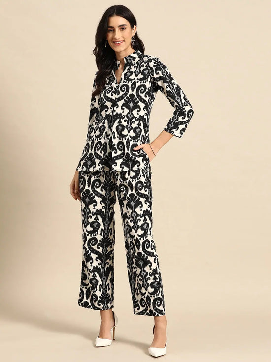 Box Pleat Shirt with flare plants in Black and Cream Ikkat Print