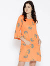 Bell sleeve Printed dress with front pockets in Peach