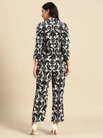 Box Pleat Shirt with flare plants in Black and Cream Ikkat Print