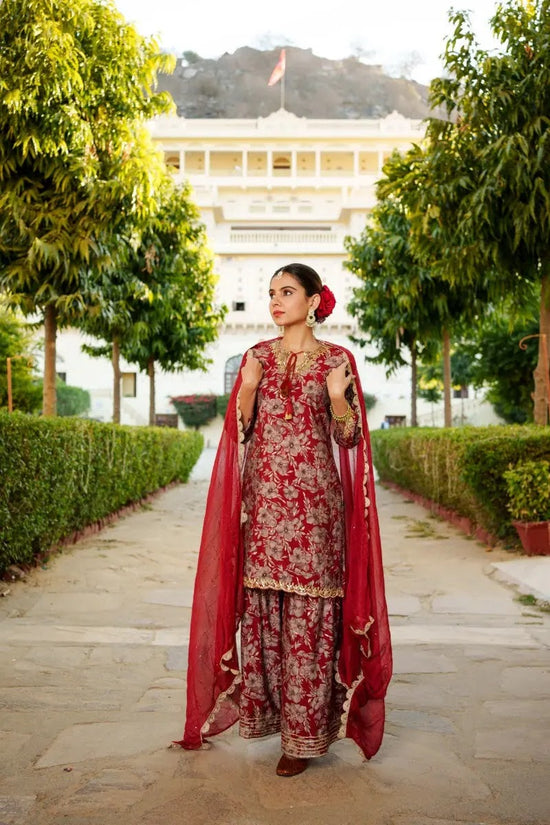 Vaasva Women Maroon Muslin Floral & Embroidered Cut Work Kurta Sharara & Dupatta set