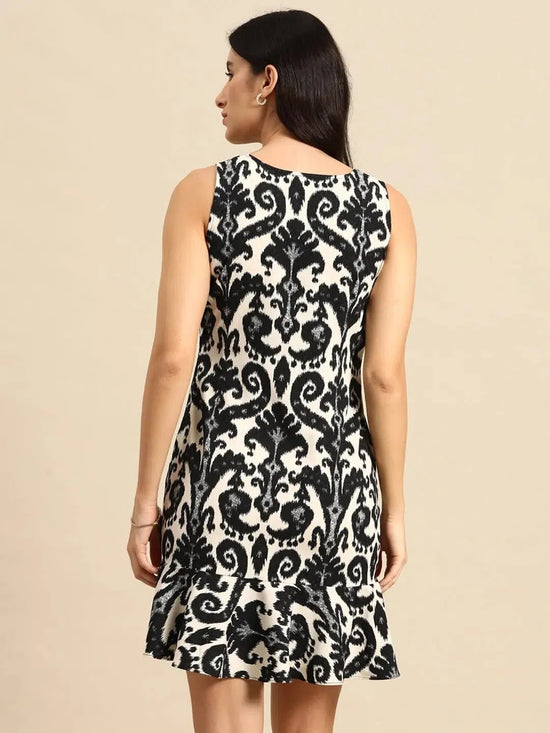 Shift Dress with flare at the hem in Black and Cream ikkat Print