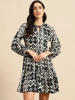 Mini Printed layered dress with balloon sleeve in Black and Cream Print