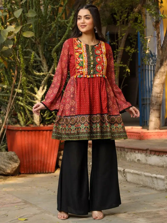 Rust Ethnic Motif Printed Cotton & Chiffon Peplum Tunic With Thread Embroidery & Tassels