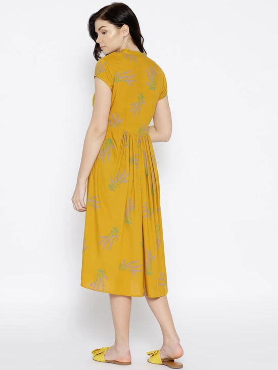 Midi pleated dress with lavender print on Mustard