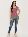 Peplum top with asymmetric ruffle and printed hem in Mauve