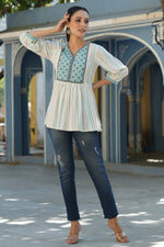 Juniper Women Ivory Rayon Staple Striped Printed Peplum Tunic.