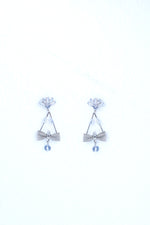 Silver Plated Stone Studded With Bow Triangle Shaped Earrings-VOJ229