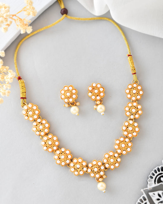 Gold Plated Pearl Studded Floral Necklace And Earrings-VOJ386