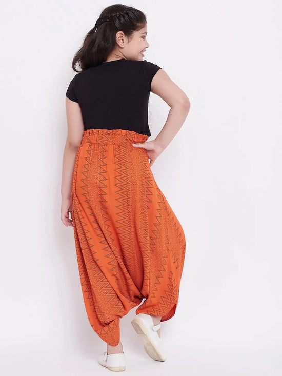 Girl's Circular Printed Top With Dhoti Pant Orange