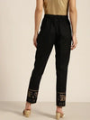 Women Black Elephant Border Foil Print Pencil Pants