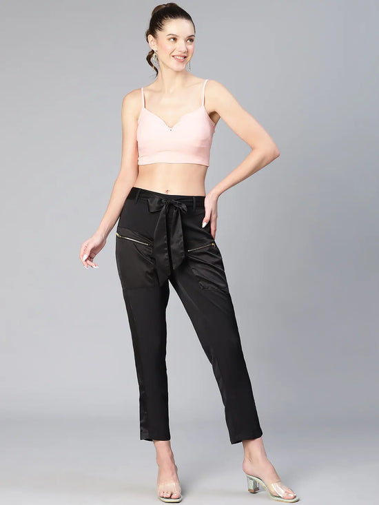 Women soild black elasticated zip detail satin pants