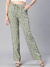 Women light green printed elasticatedwith tie-up flared pant