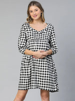 Women check print v-neck ruffled elasticated navy blue maternity dress