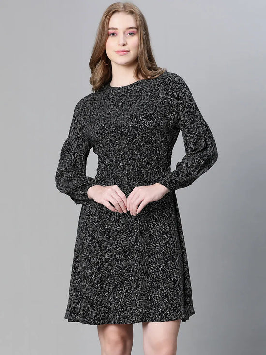 Women black floral print round neck smocked long sleeve flared dress