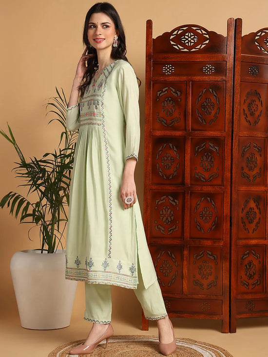 Ahika Women Green Silk Blend Solid Embroidered Flared Kurta with Trouser