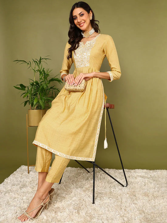 Ahika Women Yellow Silk Blend Solid Embroidered Kurta Palazzo