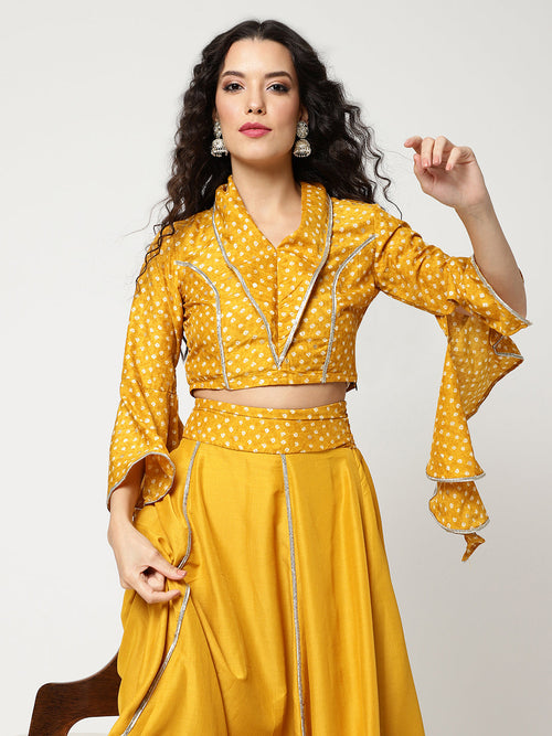 Bandhani Foil Printed Collared Crop Top Having Laces With Bell Sleeves And Solid Matching Flared Skirt Set