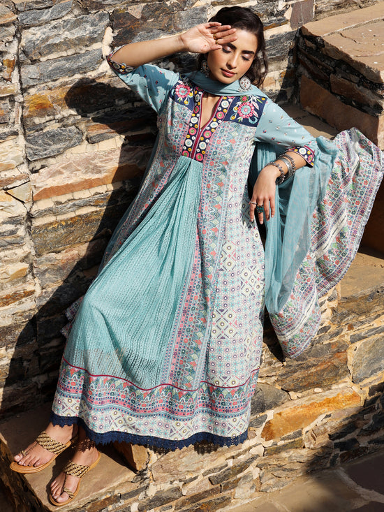 Juniper Women Sky-Blue Cotton Cambric Tribal Printed with Embroidered Flared Kurta & Dupatta Set.