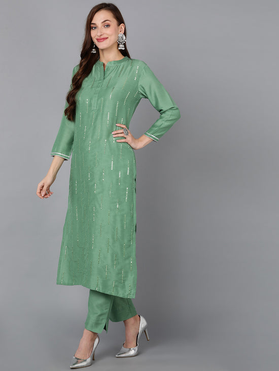 Ahika Women Silk Blend Embroidered Kurta Trouser