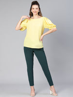 Women solid yellow puff sleeve polyester top