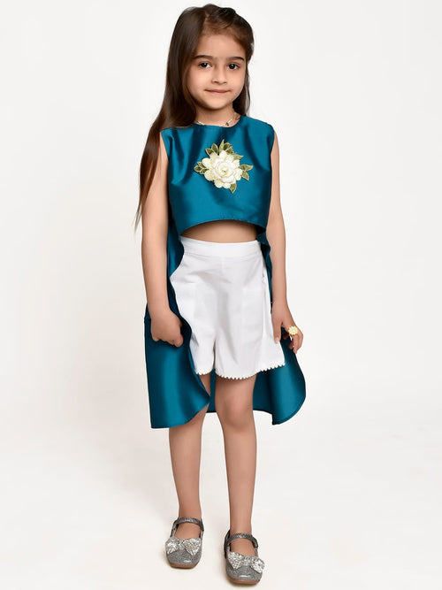 Jelly Jones Turquoise Asymmetric Flower Emblished top and White shorts