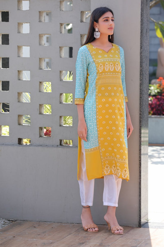 Women Daily Wear Yellow Color Crepe Fabric Printed Fancy Kurti